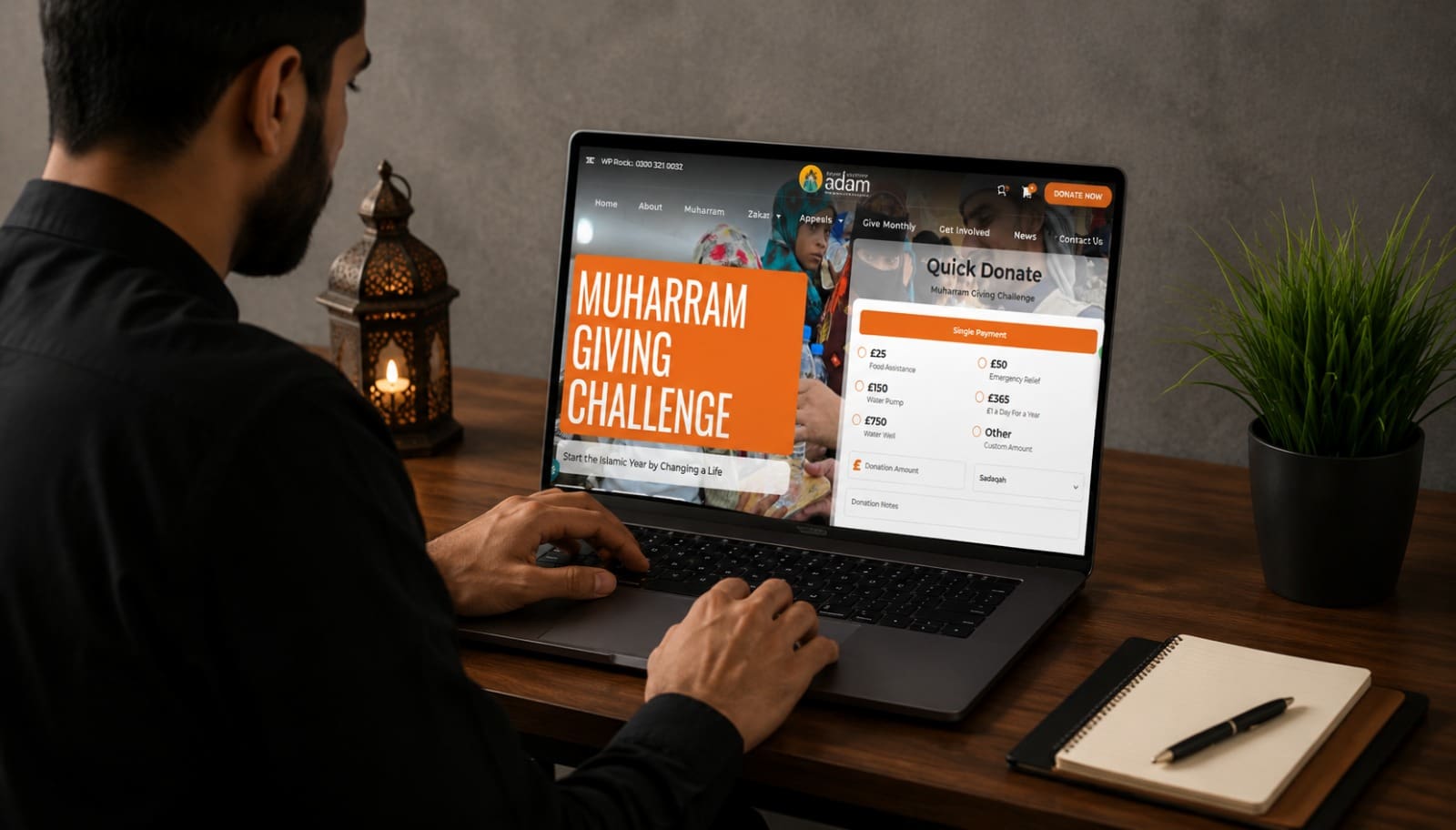 How to Donate Water Pump in Muharram Online Safely 2 In the image "how-to-donate-water-pump-in-muharram-online-safely.jpeg", a person sits at a wooden desk typing on a laptop that displays the Children of Adam charity website page for the "Muharram Giving Challenge." The screen shows online donation options for causes like food assistance, water pumps, and water wells, with a traditional lantern and a notebook placed on the desk nearby.